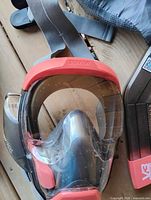 Front view of Seaview 180 V3 mask showing full-face lens, red trim and gray straps