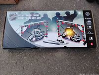 Front of retail box showing product image and contents list
