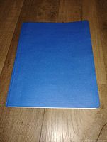 Closed blue binder front cover