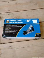 Front of boxed plane showing branding and product image