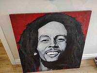 Front view of entire Bob Marley oil painting
