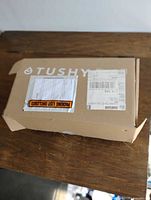 Closed TUSHY retail box