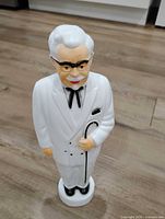 Front angled view of Colonel Sanders coin bank