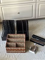 Full set showing wicker organizer, two plastic file holders and two metal hole punches