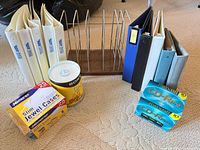 All items in lot: binders, CD spindle, Maxell packs, Memorex jewel case pack, wire file rack