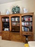 Front view of three-piece wall showing one bookcase section