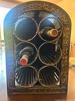 Front view with two wine bottles showing six compartments