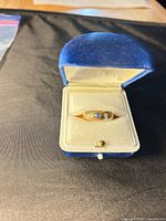 Ring in open blue velvet box