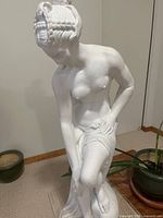 Front view of white plaster Venus statue