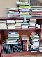 Full bookshelf showing all books in lot