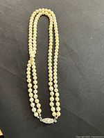 full view of double-strand pearl necklace