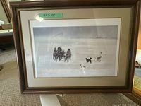 Frontal view of framed winter scene print showing image, mat and frame