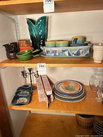 shelf view showing full assortment of dinnerware and serveware pieces
