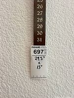 close view of numbered slat showing numbers 23-31 and dimension tag