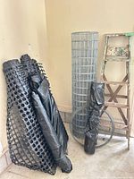 Group shot showing welded wire roll, plastic rolls, wire coil and ladder