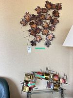 Both wall sculptures mounted to show overall appearance and scale