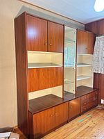Full view of assembled teak-tone modular wall unit
