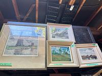 Group shot of four framed artworks showing sizes and subjects