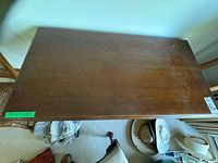 Top view of desk showing wood grain and wear