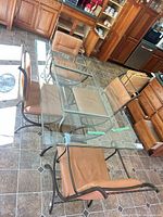 Top view of glass table and four chairs