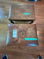 Top view of both footstools showing leather tops and size labels