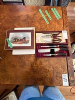Overall lot: open carving set case showing knives, fork, steel; two Pimpernel placemat tins