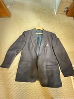 Navy subtle-check blazer laid flat showing exterior details