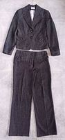 Full suit laid flat: blazer and trousers