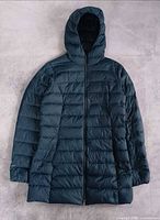 Front view of hooded dark teal Eddie Bauer puffer jacket