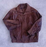 Front view of brown leather bomber jacket
