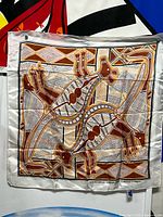 Full view of square satin scarf showing Aboriginal-style design and condition