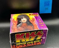 Front angled view of sealed KISS Series 2 hobby box showing graphics and shrink wrap condition