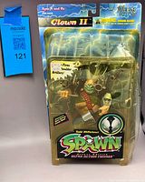 Front view of sealed Clown II action figure in blister card