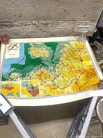 Full view of large colour map laid on table