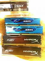 Two blue G.Skill Ares and two black Kingston HyperX Fury DDR3 DIMMs