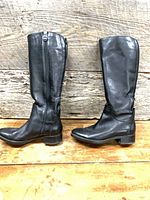 Side view of both boots showing overall shape, leather condition and soles