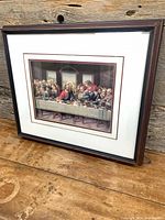 Front view of framed 3D cut paper Last Supper shadow box