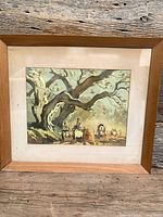 Full view of framed watercolour in wood frame