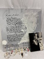overview of large canvas, small canvas, figurines, metal stands