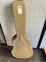 Closed Crossrock tweed vinyl guitar case front view