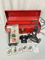 All lot contents including toolbox, rotary tool on router base, VersaTip kit, accessory packs, holders