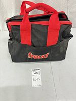 Freud black fabric tool bag with red straps and logo