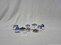 All nine Jewel series paperweights grouped