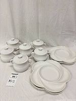 Full set of six cocottes with lids and four flower plates