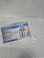 Front view of sealed Mastercraft spray gun box showing product image and capacity