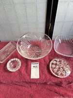 Group shot of all five clear glass serving pieces