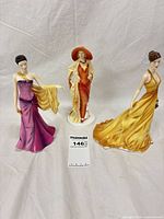 All three Royal Doulton Pretty Ladies figurines standing side by side