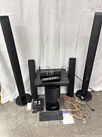 Entire Samsung home theater system with speakers, subwoofer, receiver, keyboard, cables