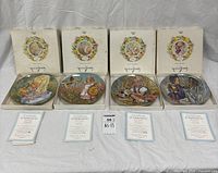All four boxed plates with certificates displayed