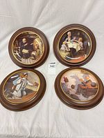 Front view showing all four framed Rockwell plates